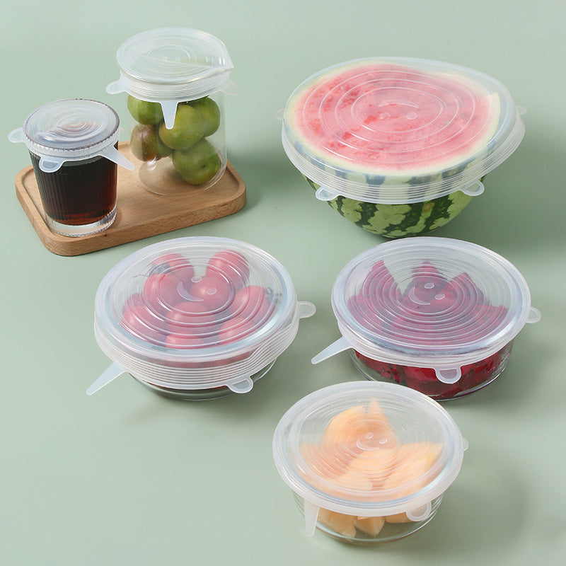 Six blue silicone stretch lids displayed in various sizes for kitchen bowl covers